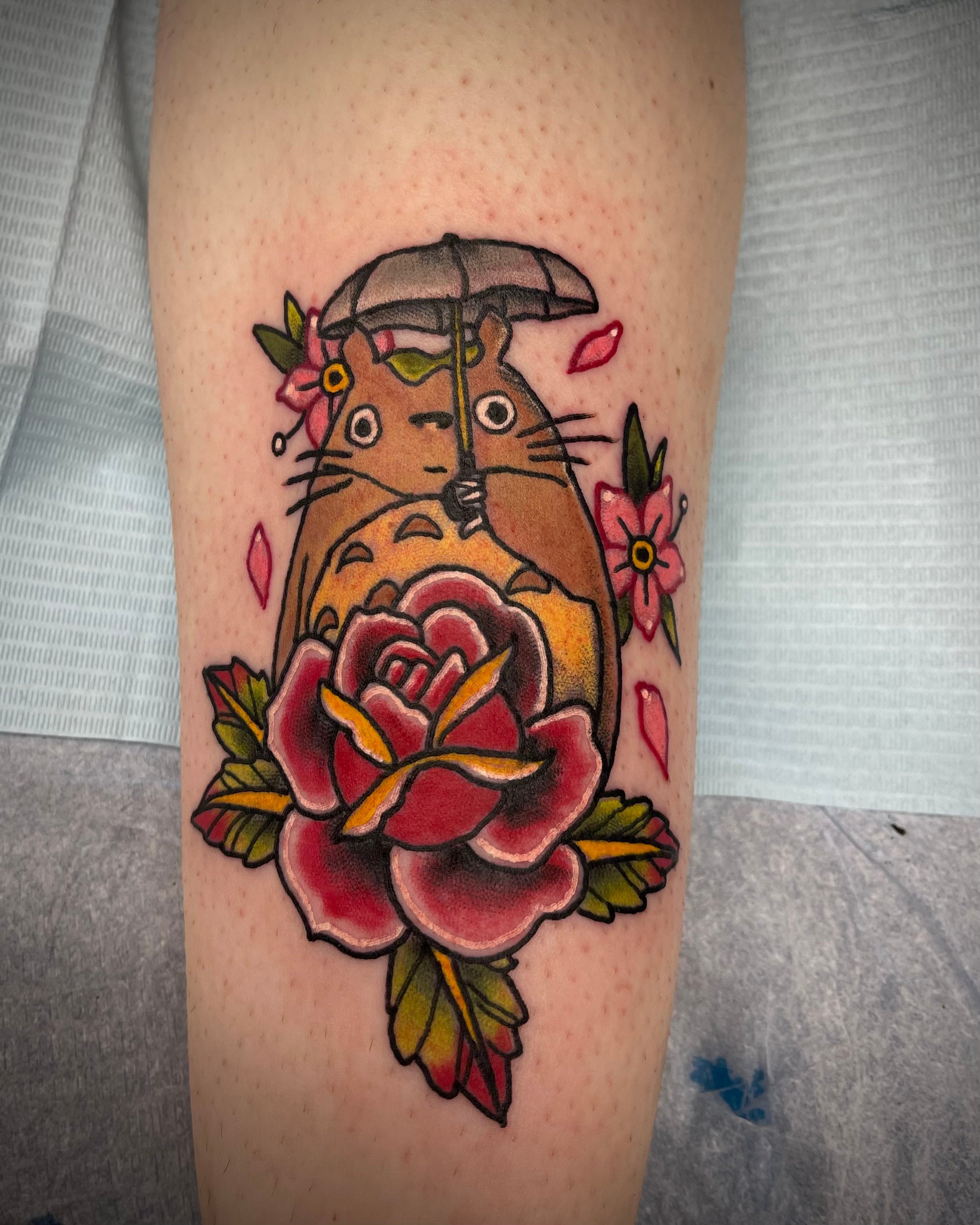 hampster and flower tattoo