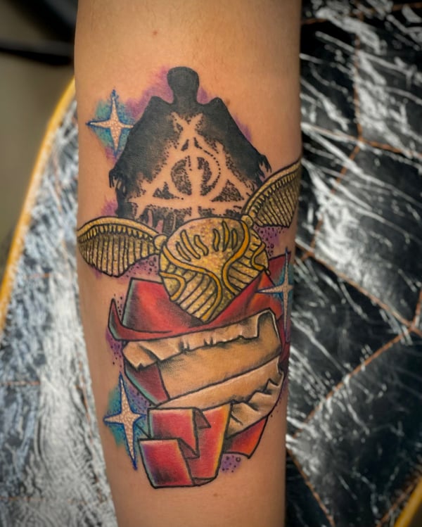 harry potter tattoos - golden snitch tattoo