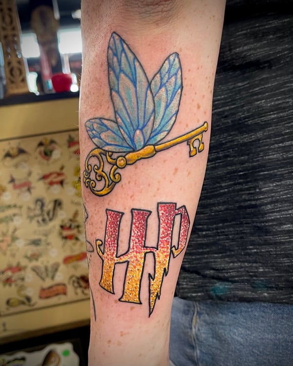 harry potter tattoos - harry potter flying key tattoo