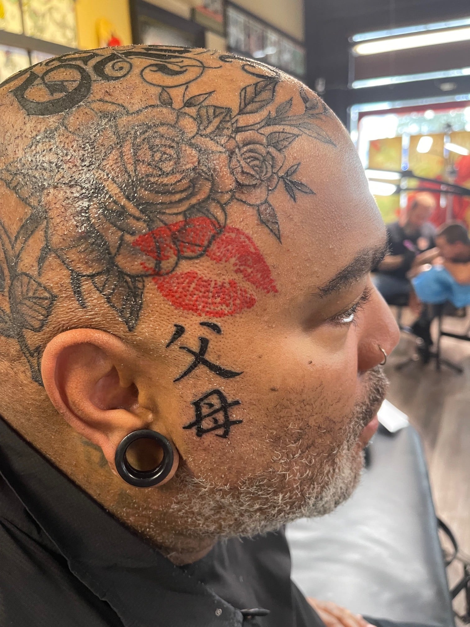 Rose on Head Tattoo