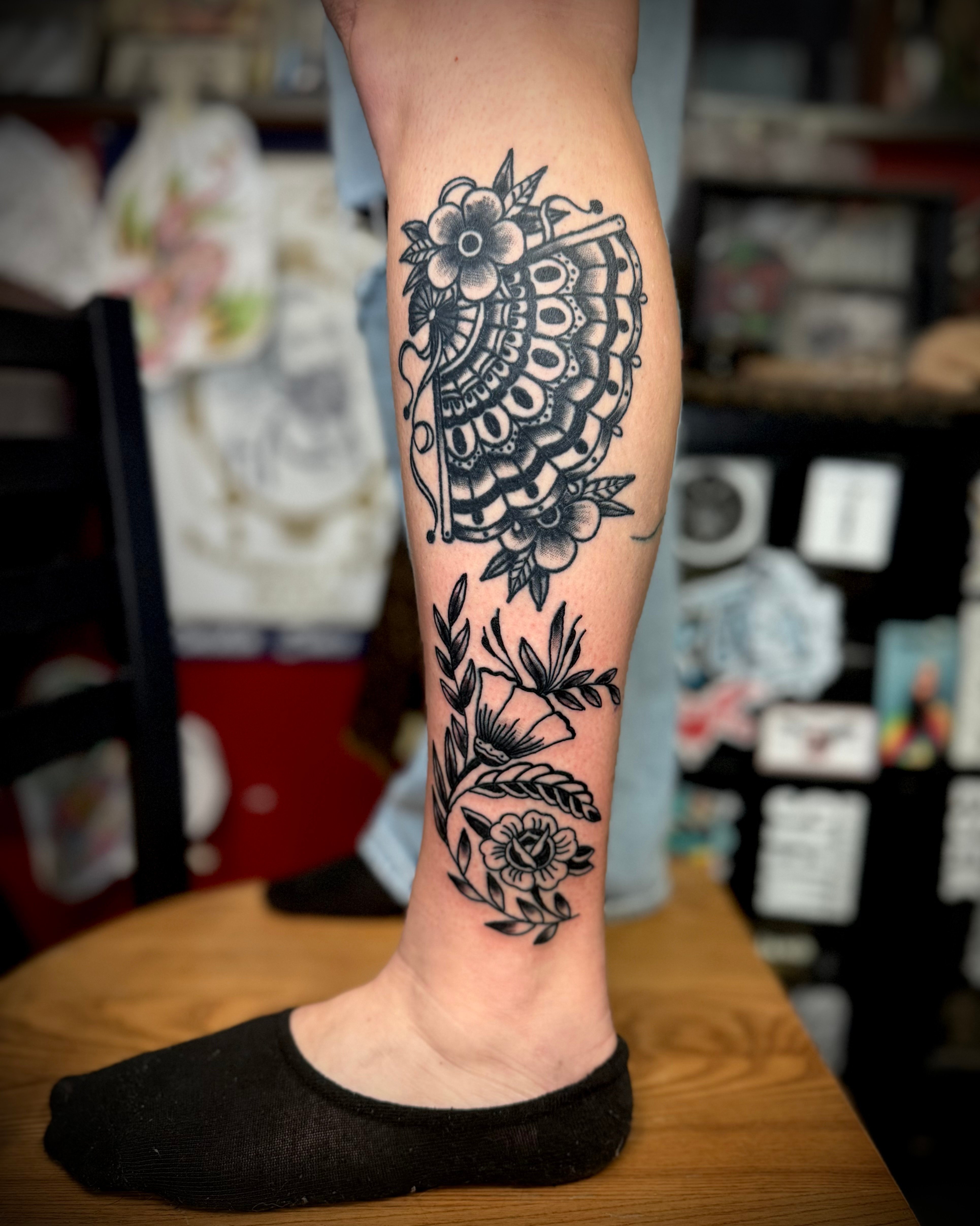 Traditional Fan and Floral Tattoo