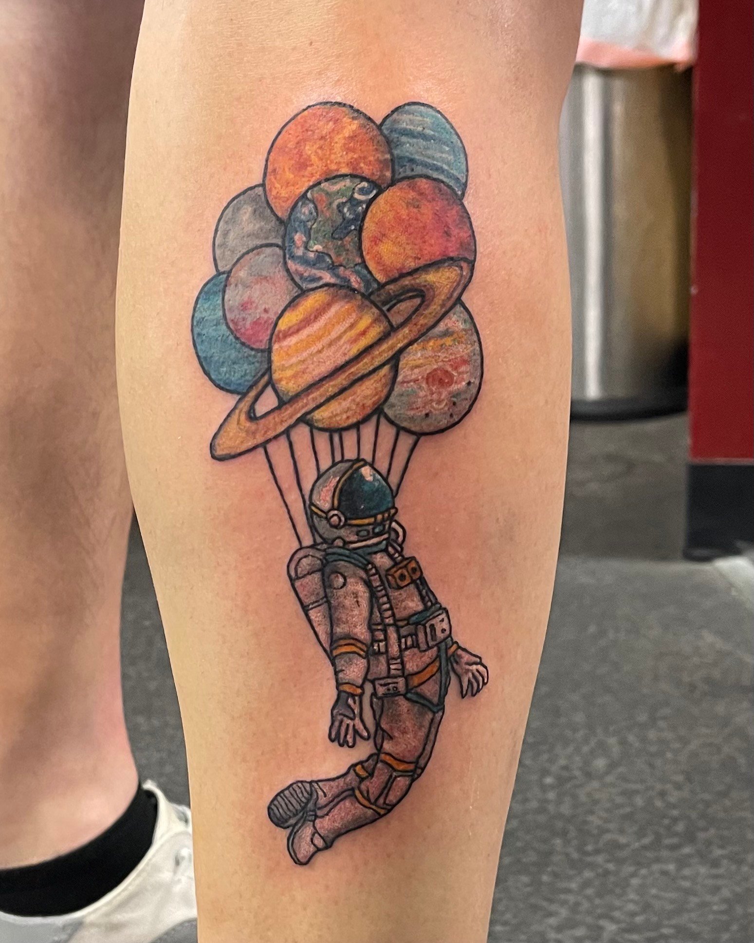 astronaut and planets balloon tattoo